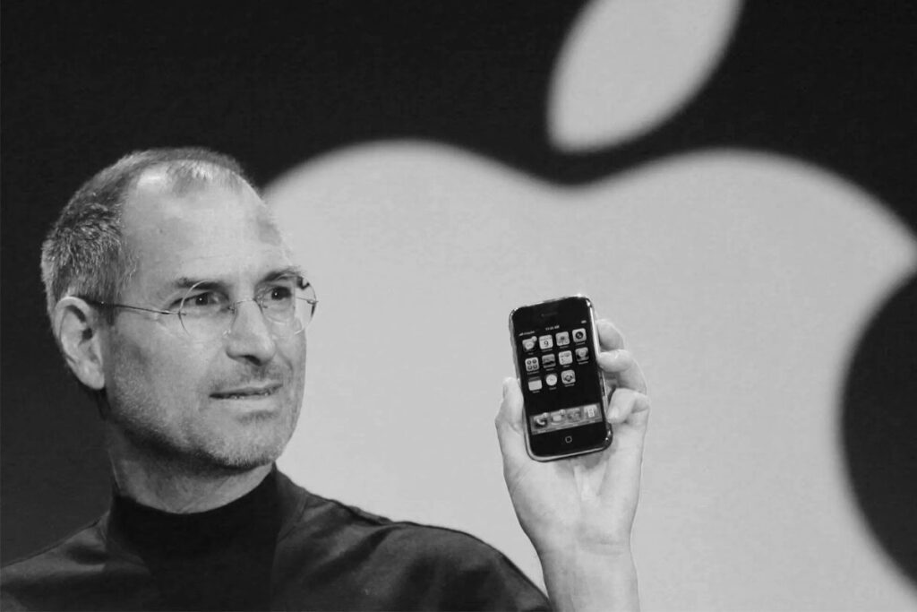 Steve jobs holding iPhone in his hands during WWDC