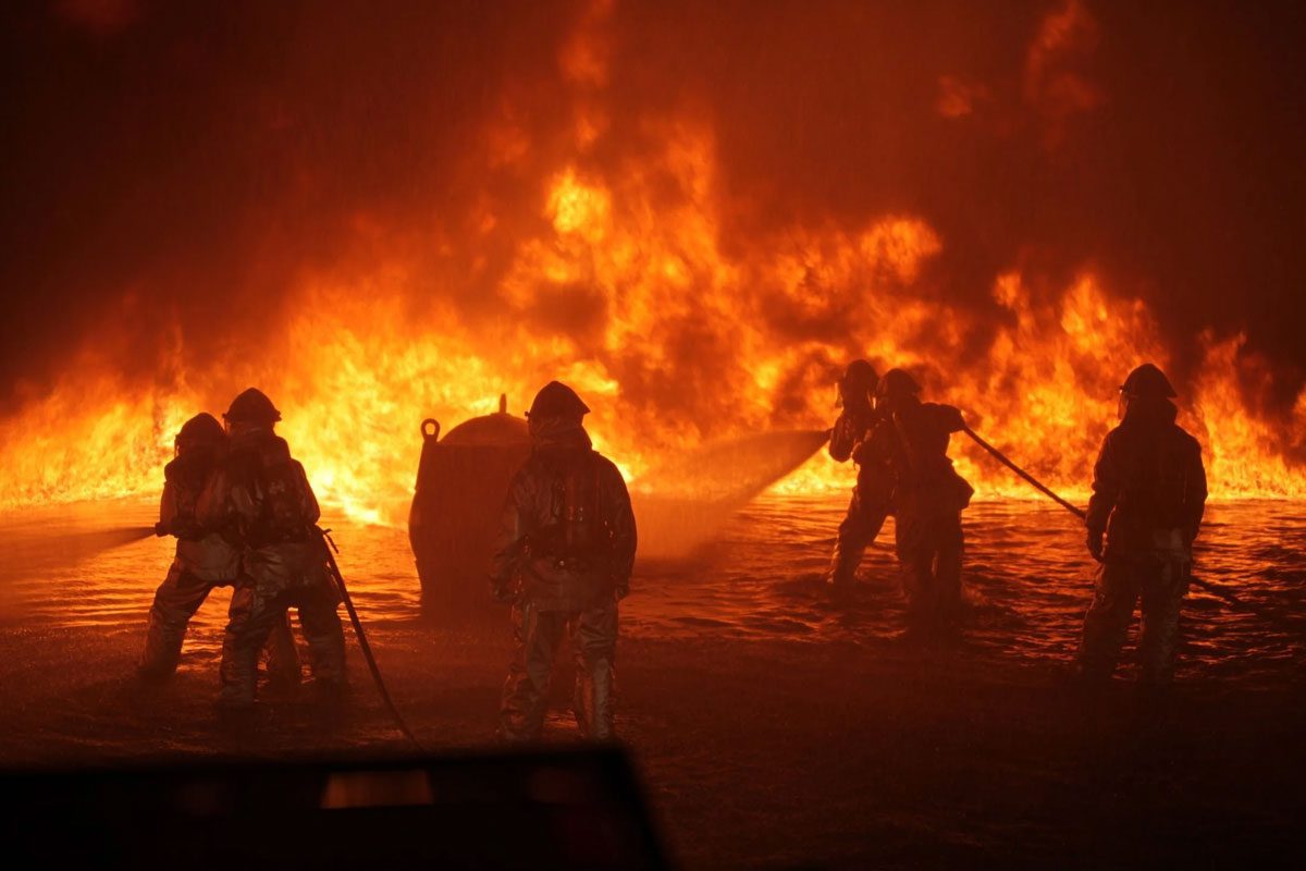 Firemen Fighting Forest Fire